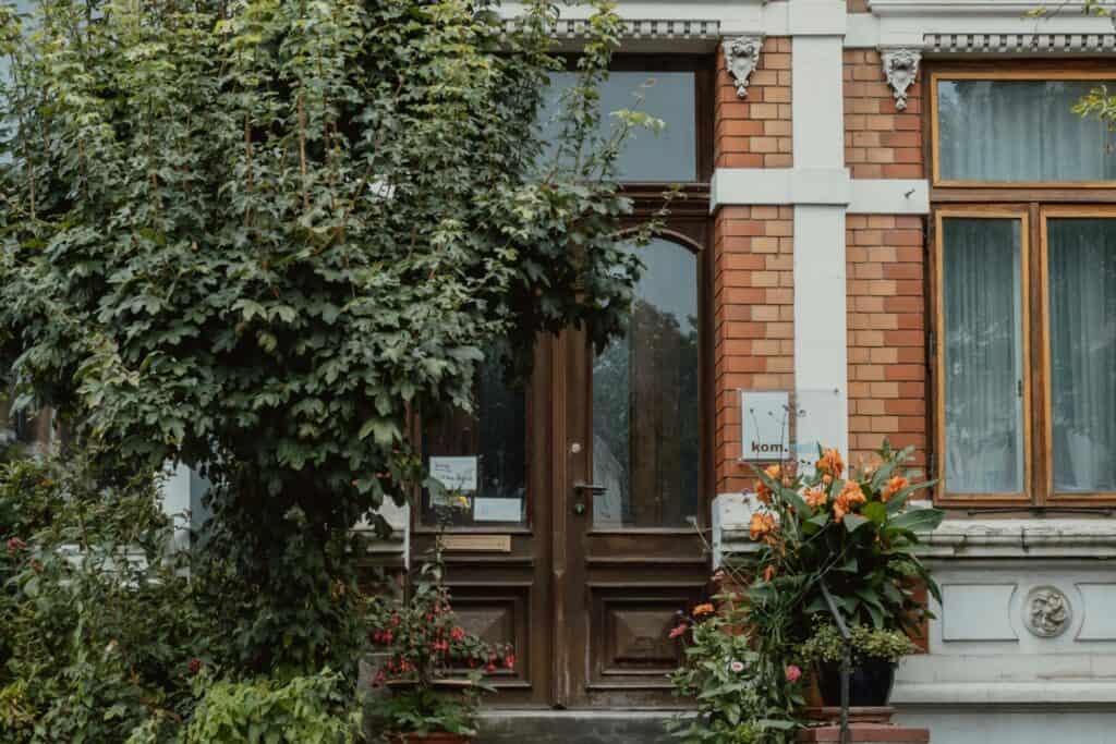 Brown main door of a modern brick house