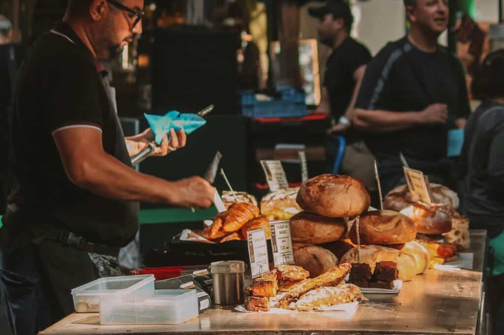 A bread stall in a local market in the concept of 'local shops and markets in South London'.