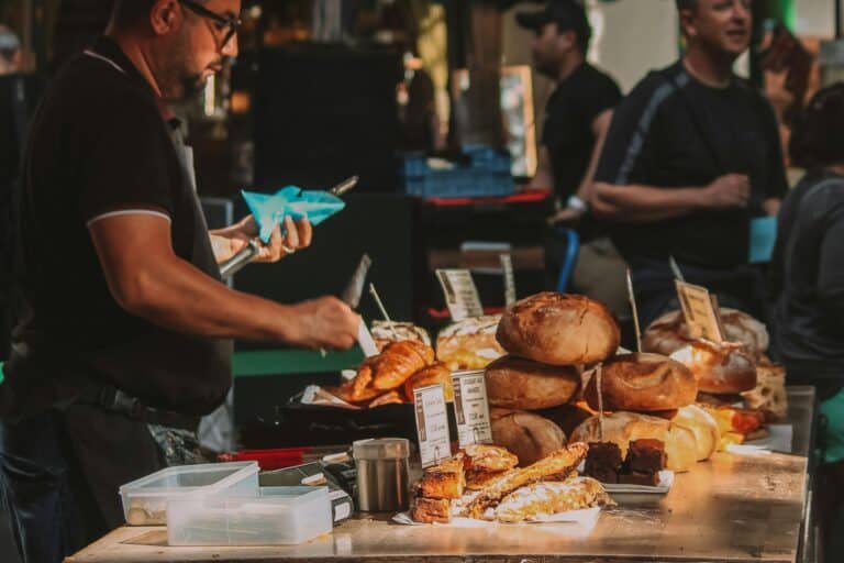 A bread stall in a local market in the concept of 'local shops and markets in South London'.