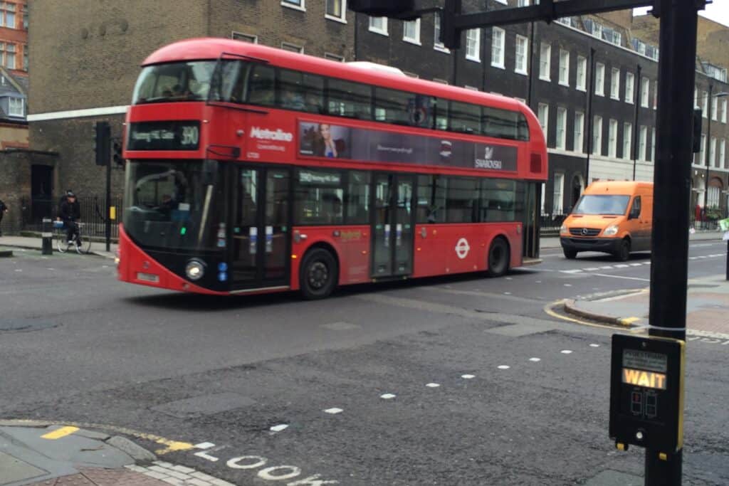 A double-decker bus in a junction